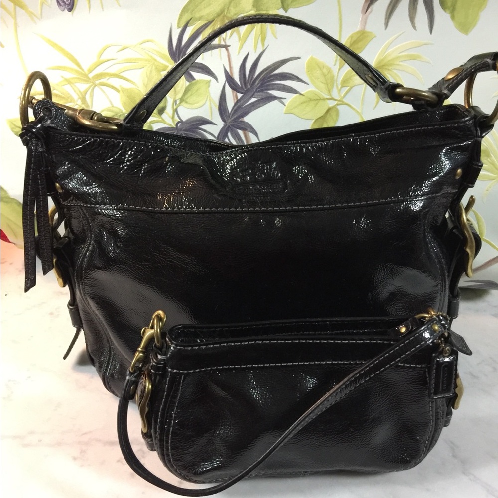 Black leather coach purse and accessories bag
